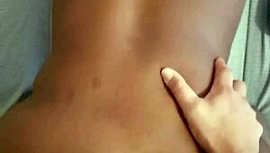 Mistress oils up her slaves for bed play