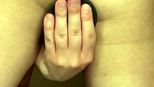 kai explores solo with a dildo in wet conditions