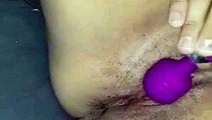 i'm watching my sister masturbate with a dildo, giving herself a sensual massage