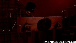 Sexy domme spanks sub in pillory!