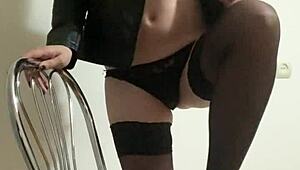 sexy girl sits on chair and starts masturbating slowly