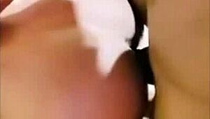 This ebony teen gets pounded by a huge black cock in doggystyle.