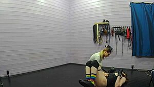 In the femdom dungeon, a cute pony transgirl endures riding and training under her mistress's strict control