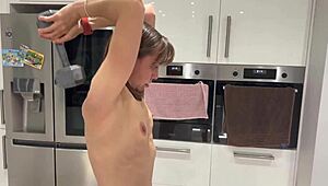 Athletic woman performs nude workout session