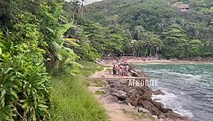 Beach threesome with big asses bent over