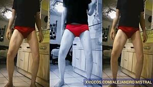 Thin mature guy Alejandro Mistral shows off his big cock in red underwear