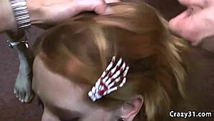 Blonde drenched in jizz during wild blowbang session