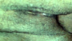 She enjoys sucking this black treat