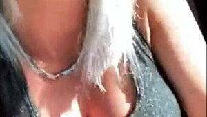 Imagine this amazing blonde fingering herself in the car, outdoors.
