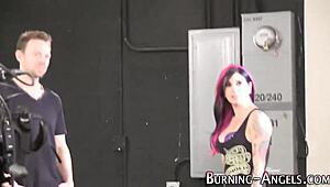 Goth alternative slut poses in heels with tattoos behind the scenes