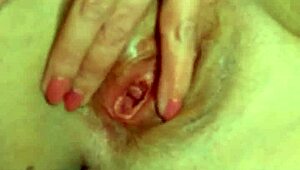 Amateur brunette fingers her tight pink pussy in stockings