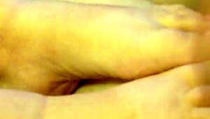 my wife gives a hot footjob with pink toenails and cumshot