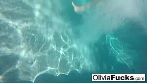 olivia enjoys summer pool fun with her big tits exposed