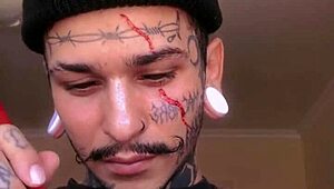 Guy plays with his cum like paint