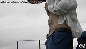 Watch the guy next door strip naked and cum outdoors!