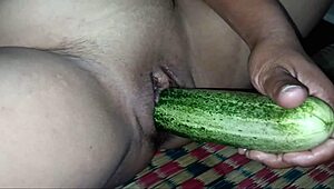 Beautiful teacher with big ass masturbates using cucumber