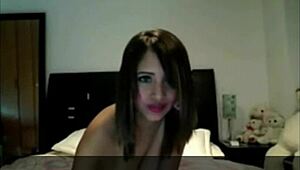 Teen brunette casually shows off her big tits on webcam