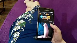 I watch this real amateur milf masturbate while she views porn