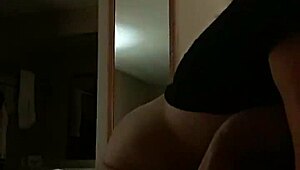 A sexy young girl with small tits poses and teases in this casual scene.