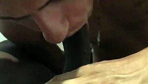 Well-Endowed Gay Guy Sucks Big Black Cock at Gloryhole