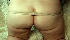 Old milf masturbates with favorite gold anal toy, inserting it deep into her ass for intense pleasure