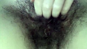 This hairy teen performs on webcam with her natural body.