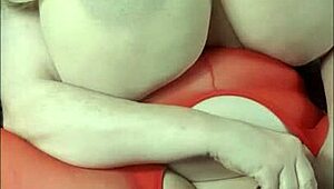 Lady with huge tits lies back enjoying a massive BBC toy session