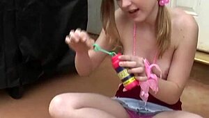 kitty karsen strips nude, playing bubbles and flashing her natural tits.