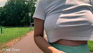 Milf dares to flash big tits braless in wild public run!