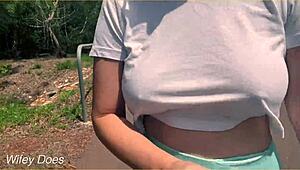 Milf dares to flash big tits braless in wild public run!
