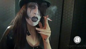 Goth Girl Shows Off Her Big Tits While Smoking