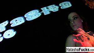 Busty Natasha Nice masturbates nude in sexy black light video.