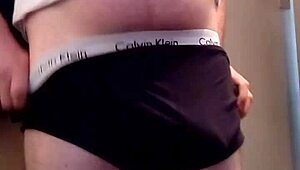 Horny Brit Wanks Huge Cock at Home