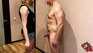 mistress tests slave's endurance with harsh ball kicking and squeezing