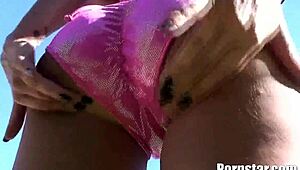 Britney Stevens, the hot pornstar, masturbates with dildo by the outdoor pool.