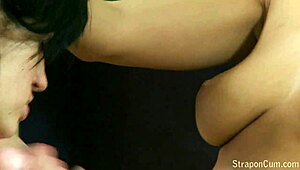 Russian lesbian duo explores strapon play in college dorm setting.