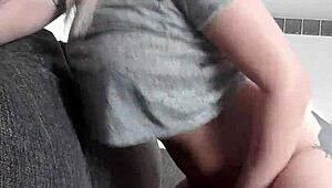 Blonde girl with big tits masturbates, moaning as she cums