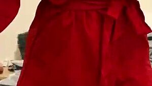 Brunette in red lingerie intensely masturbates her big tits and ass