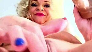 Mature lady gets naughty with big tits during work break! 😜