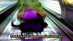 Horny Milf With Big Breasts Masturbates Wildly Under Public Solarium
