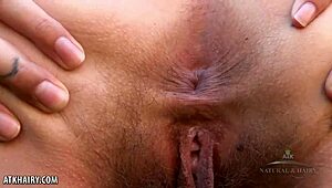 Aislynn spreads her hairy pussy wide outdoors for intense fingering