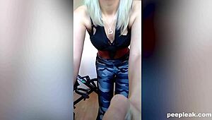 Sporty blonde fingers herself during workout