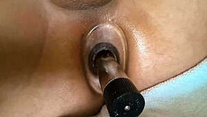 Close up tunnel anal and vibrator masturbation