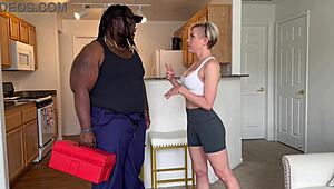 A petite 18+ woman helps the maintenance man relax with a cool drink in this free preview.