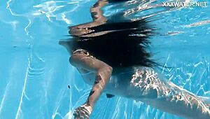Hot chick lana swims nude underwater in the pool for your pleasure.