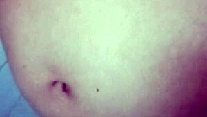 Old Indian gay bottom enjoys his own golden shower casually. He bends over for the flow.