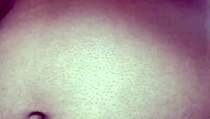 Old Indian gay bottom enjoys his own golden shower casually. He bends over for the flow.