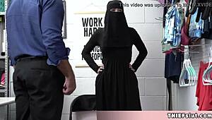 Cute Muslim chick caught hiding stolen goods under her outfit