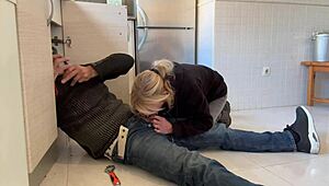 hot wife gives blowjob to plumber in kitchen, ends with cum in mouth