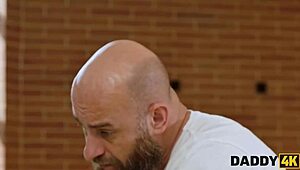 something kinky brewing between an old guy and a young 18+ tattooed babe.